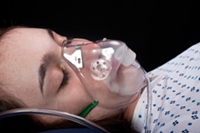 Patient  using oxygen mask