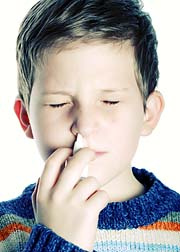 Child using nasal spray